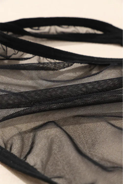 Body transparente con liguero y tiras en la espalda